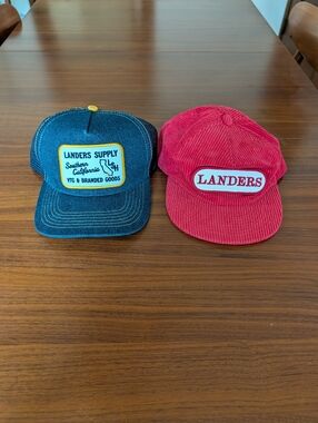Pair Of Landers Hats Landers Supply Blue Hat And Corduroy Red Hat